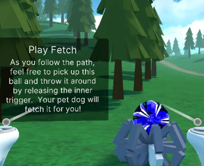 In-game “Play Fetch” sign beside the path — “As you follow the path, feel free to pick up this ball and throw it around by releasing the inner trigger. Your pet dog will fetch it for you!” — with a blue ball on a low-poly stand.