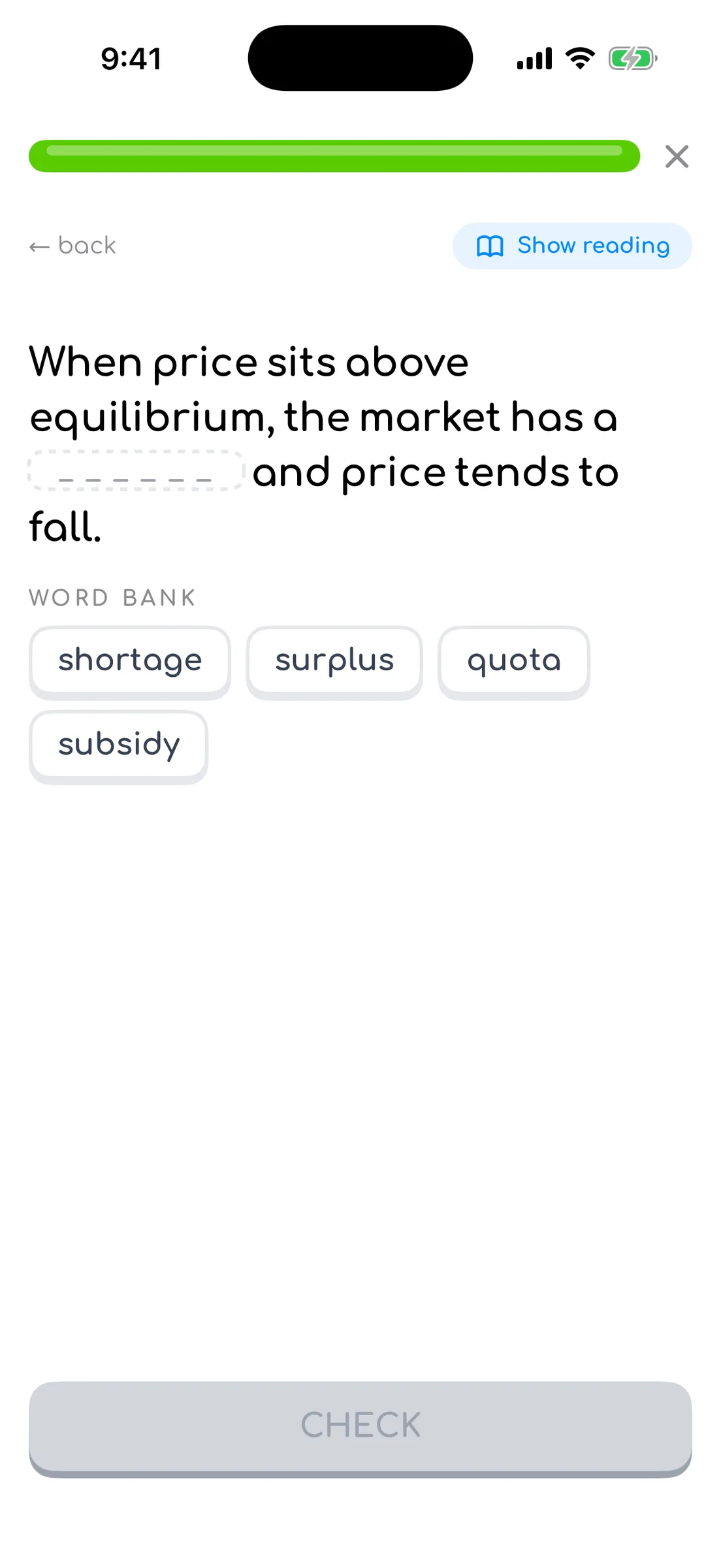 Fill-the-gap question: a sentence with a dashed blank and a word bank of chips — shortage, surplus, quota, subsidy.