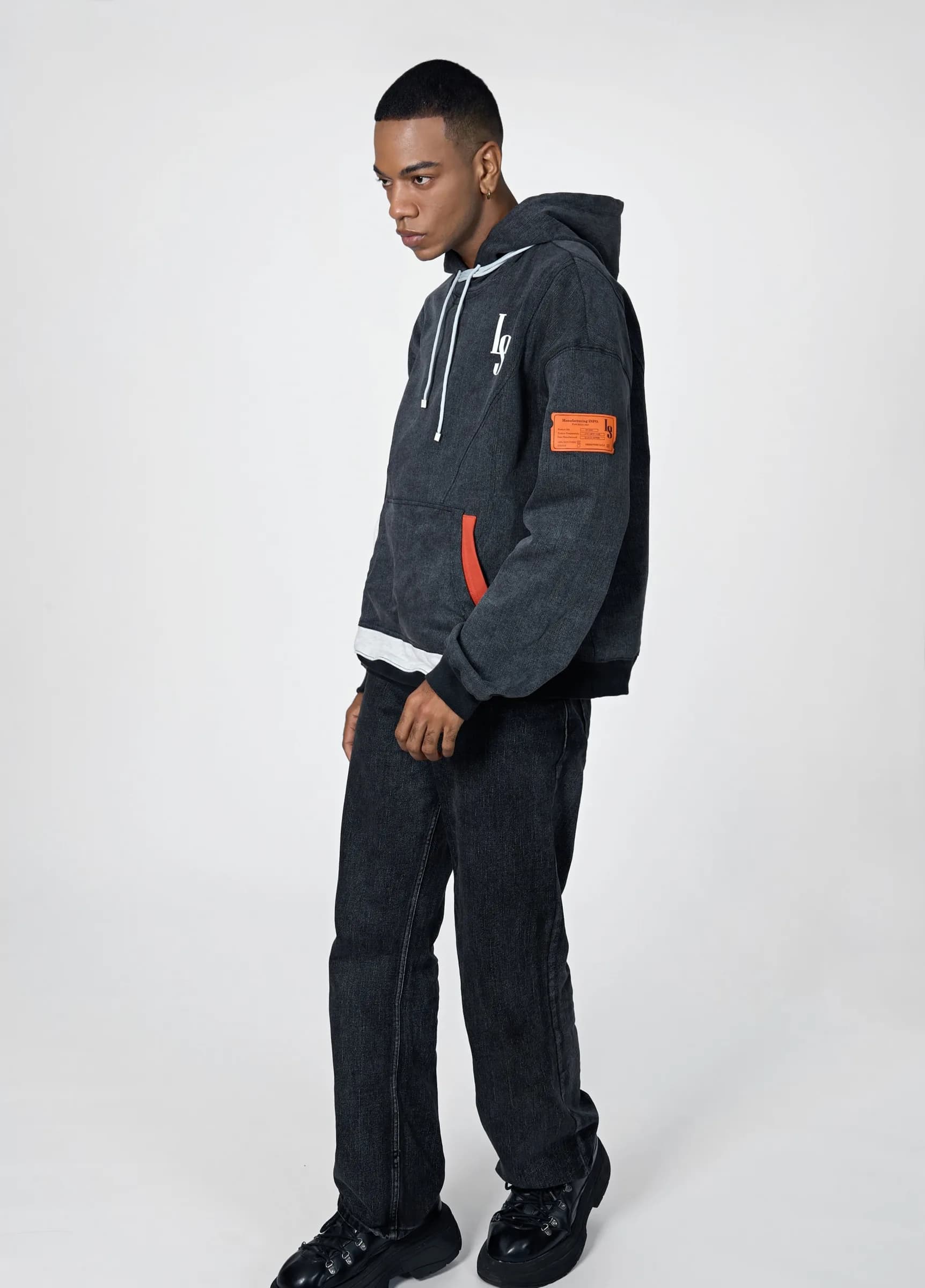 Full-length three-quarter view of the Denim Washed Hoodie